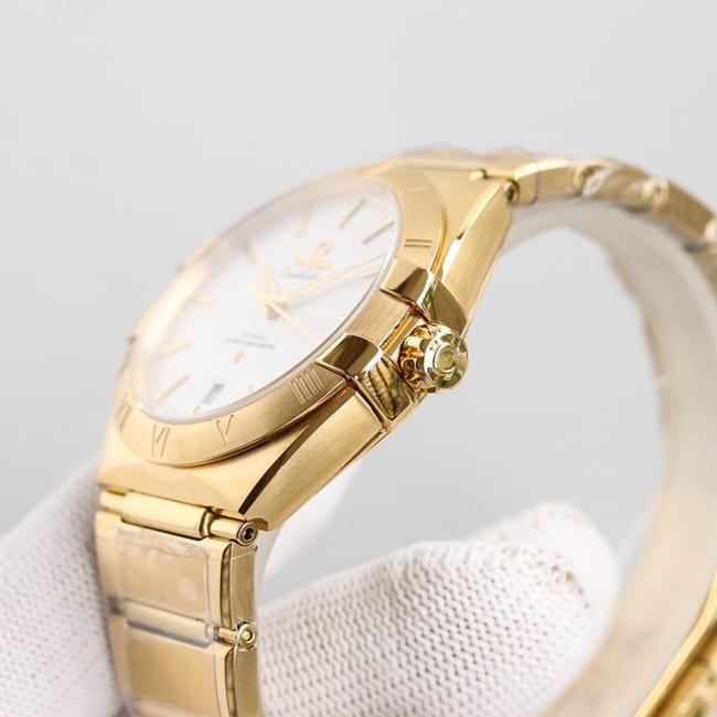 Top Replica Omega 5th Generation Constellation Series Gold Plate Gold Silver Steel Strap Men's Earth Watch Side View