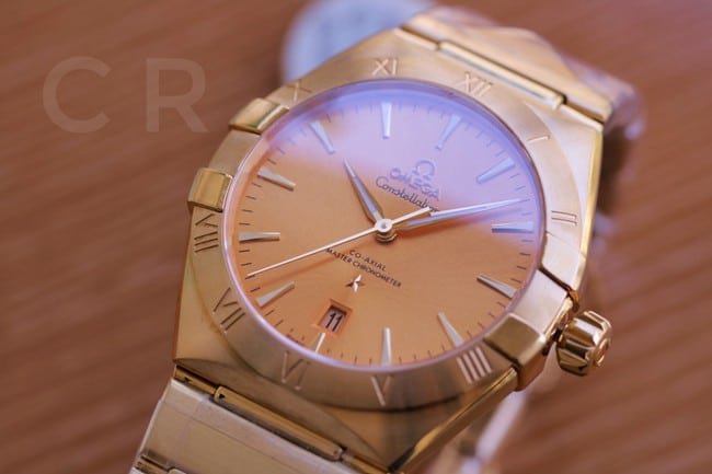 Top Replica Watches Omega 5th Generation Constellation Series Gold Plate Gold Steel Strap Men's Earth Watch Front View