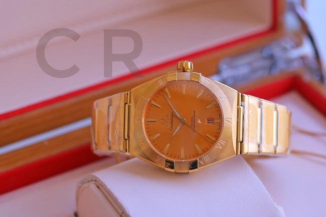 Top Replica Watches Omega 5th Generation Constellation Series Gold Plate Gold Steel Strap Men's Earth Watch Front View