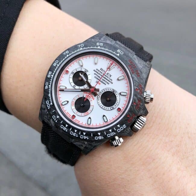 TW factory top-tier replica watch Rolex universe chronograph Daytona series carbon fiber customized version black dial white background men's watch front view