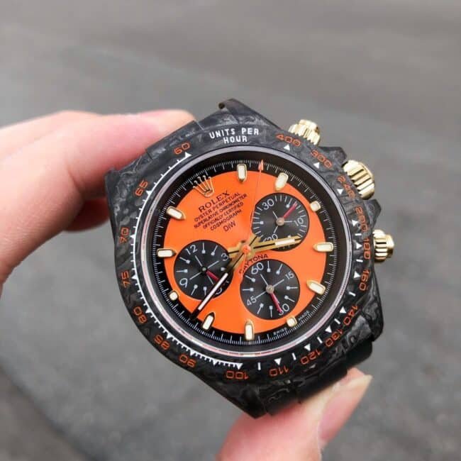 TW factory top-tier replica watch Rolex universe chronograph Daytona series carbon fiber customized version black dial orange bottom men's watch front view