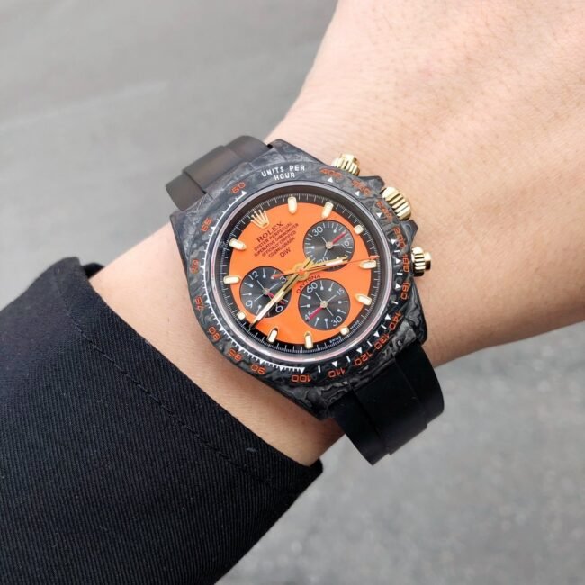 TW factory top-tier replica watch Rolex universe chronograph Daytona series carbon fiber customized version black dial orange bottom men's watch front view