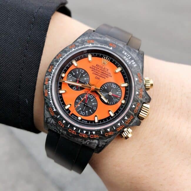 TW factory top-tier replica watch Rolex universe chronograph Daytona series carbon fiber customized version black dial orange bottom men's watch front view