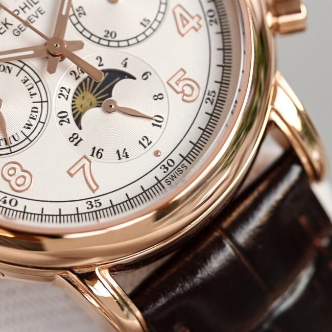 top-tier replica watch Patek Philippe rose gold white background complex function chronograph series men's mechanical watch detail shots
