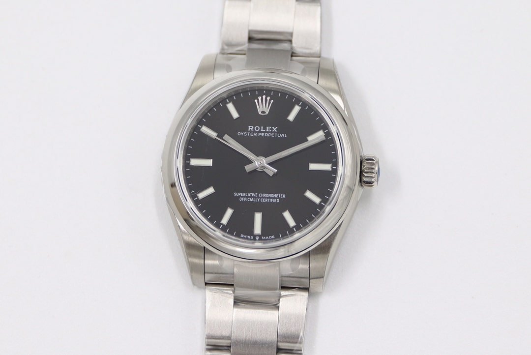 EW Rolex Oyster Perpetual Rolex Super Clone, 31MM Black Dial with Imported Movement, Steel Bracelet m177200-0019 — detailed review and buying guide | Watch Replica Expert